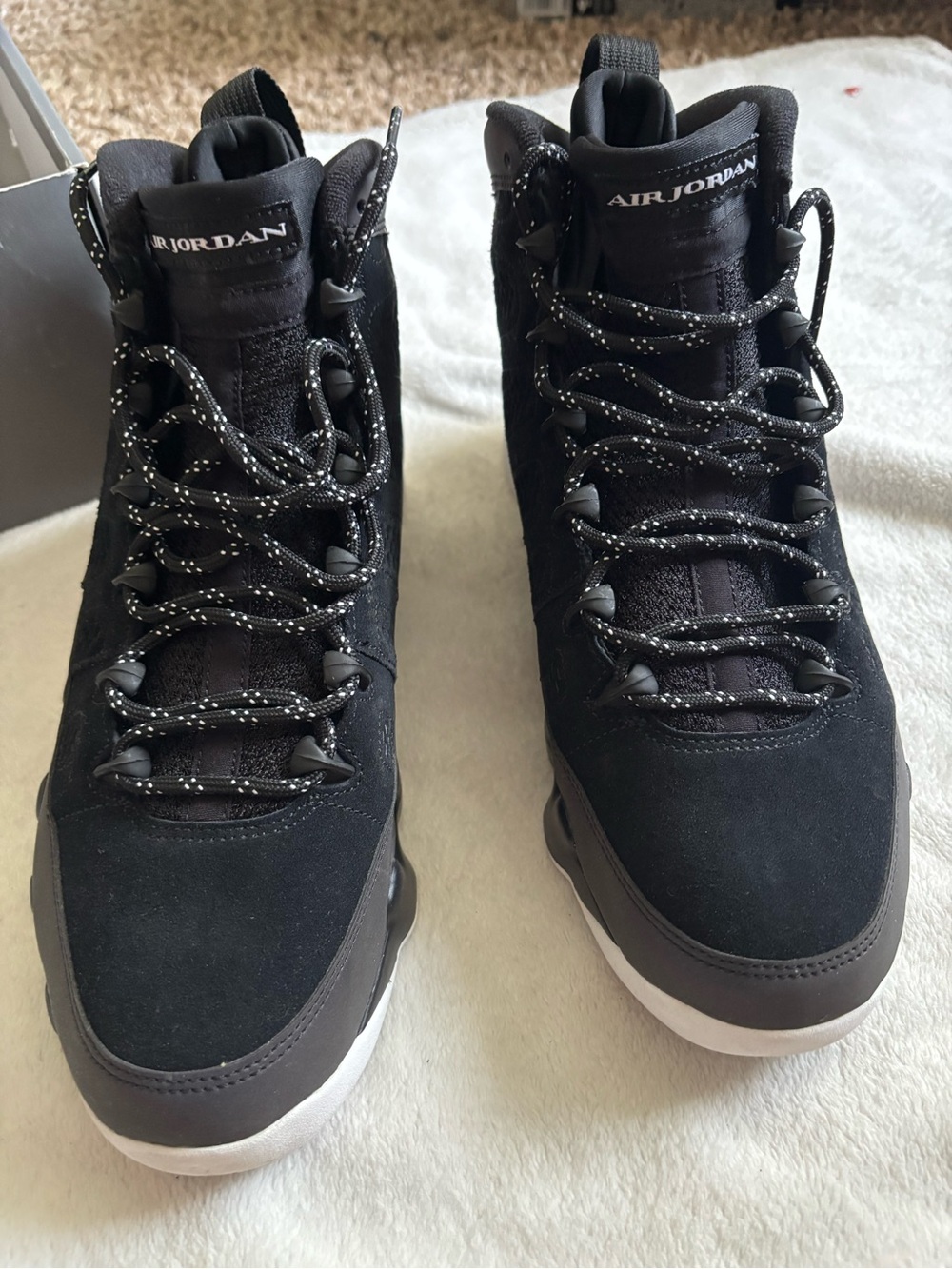 Jordan Men’s Black and White High-Top Sneakers
